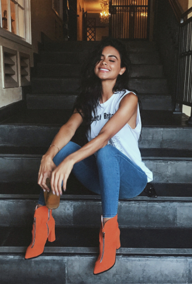 Sophia Miacova featured in the orange RHODA boots